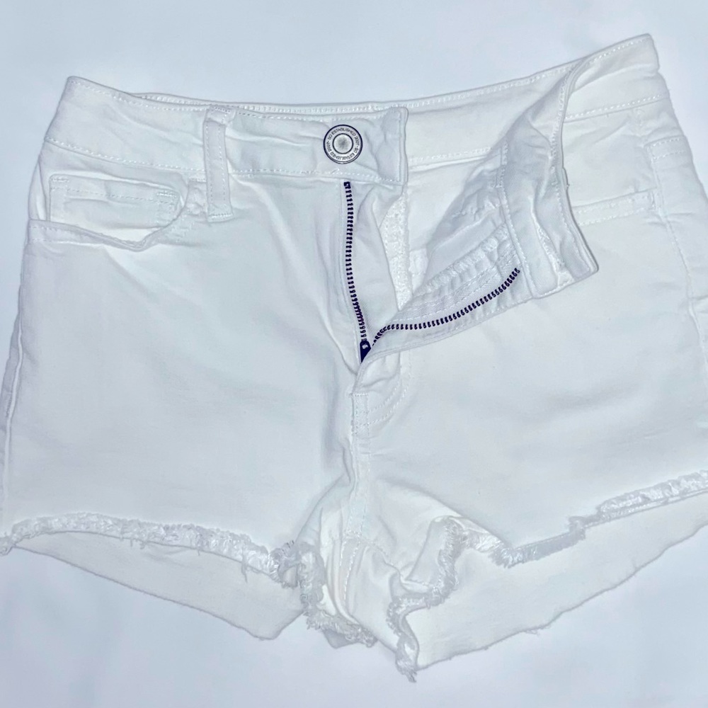 White jean cutoff style shorts